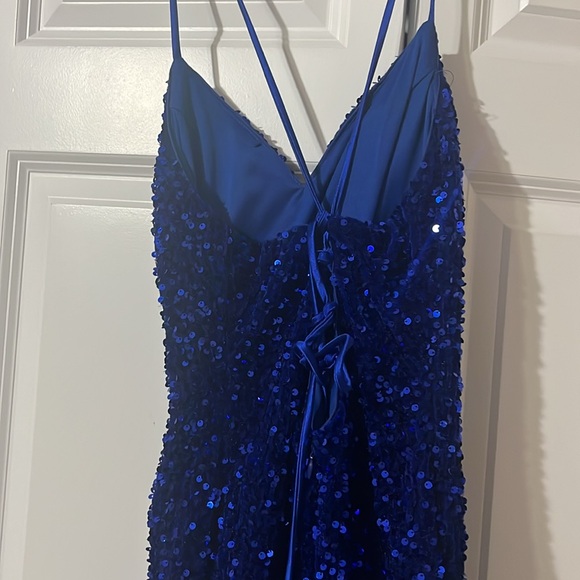 A navy blue prom dress. This is a size 2 from the store MDM. - Picture 4 of 4